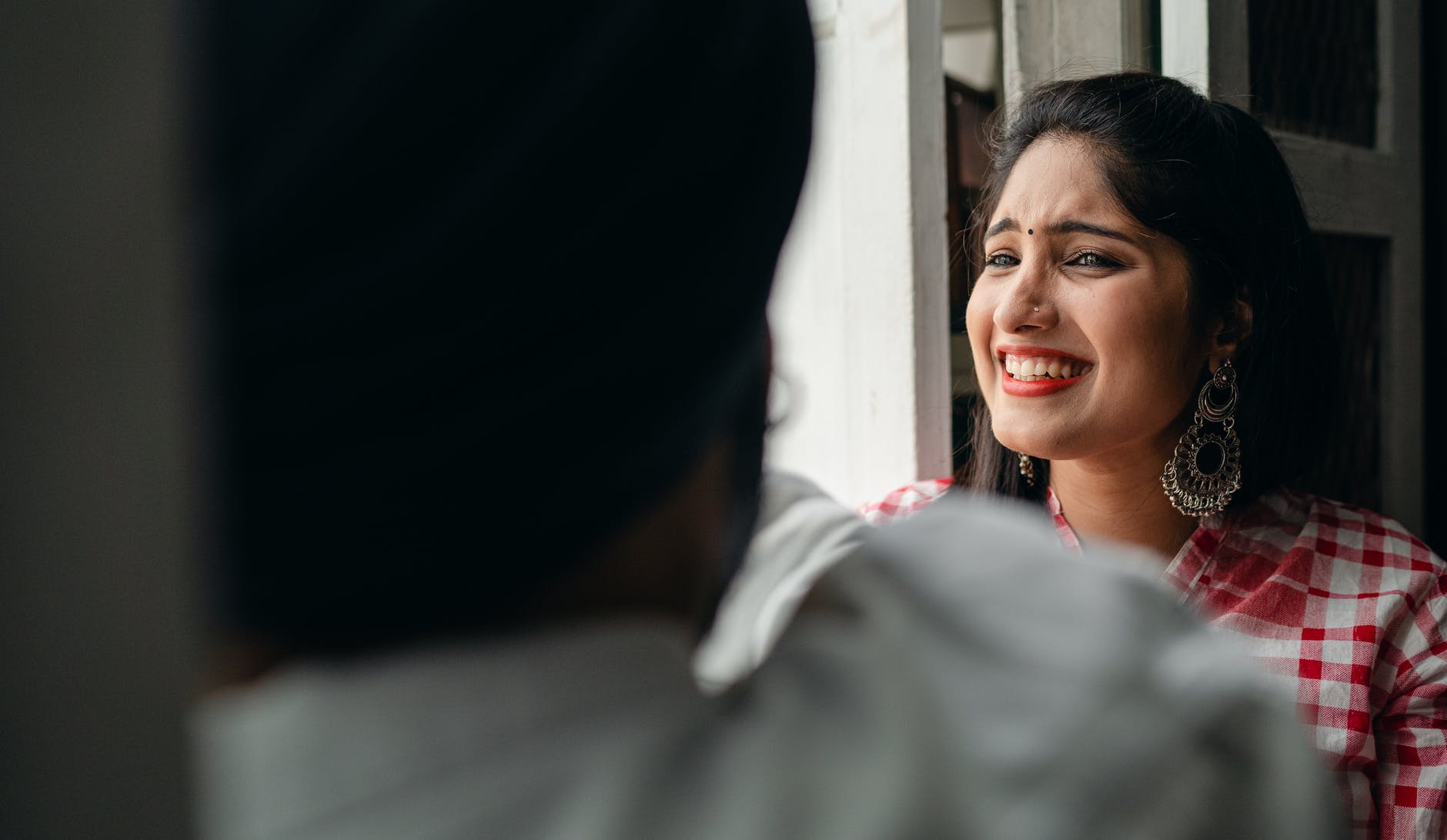 young female laughing with funny man